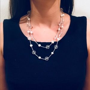 Long white beaded necklace